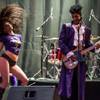 Prince impersonator Jason Tenner performs during the grand opening of the D Las Vegas on Wednesday, Oct. 10, 2012.